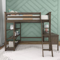 Wooden loft bed with built-in desk and shelving in kids' bedroom, teal geometric accent wall, white rug and modern lamp — space-saving study and storage solution
