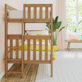 Solid wood bunk bed in pastel kids' bedroom with yellow bedding, peach curtains, potted plant and sunlit window