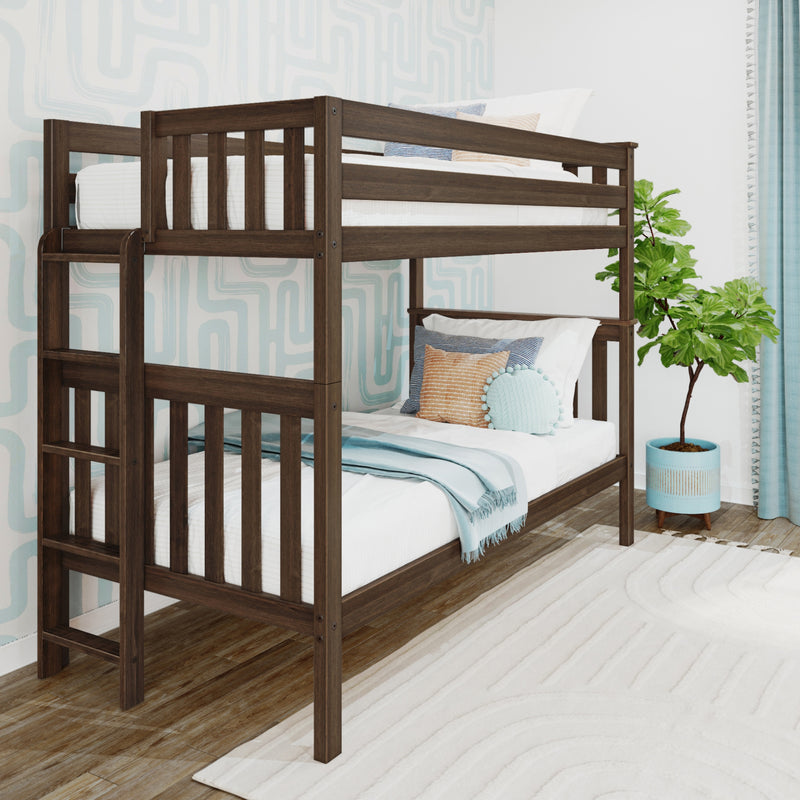 Wooden bunk bed with cozy blue and white bedding in a modern room with plant and geometric wallpaper.