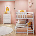 Pink children's bedroom with white wooden bunk bed, peach bedding, yellow round pillows, white dresser, cat wall art and pastel bunting