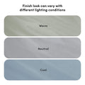 Wood finish color variations displayed as three rounded swatches labeled Warm, Neutral, Cool beneath header "Finish look can vary with different lighting conditions