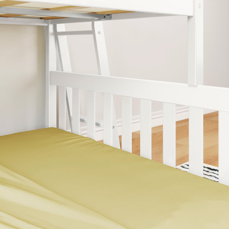 White wooden bunk bed with ladder and yellow bedding in a modern bedroom setting.