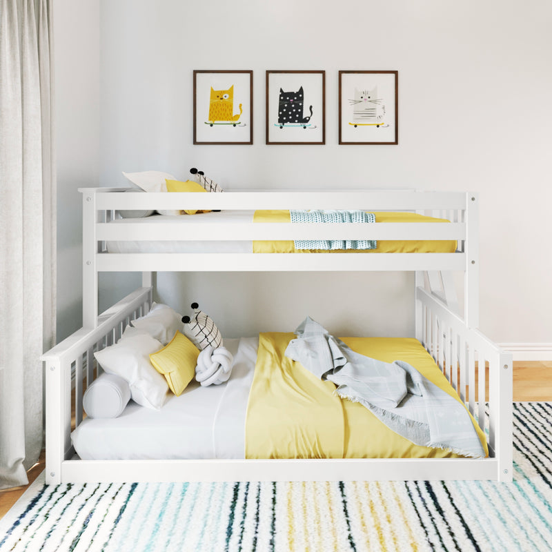 White bunk bed with yellow bedding in modern children's bedroom with playful cat artwork on the wall.