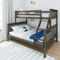 Grey oak twin-over-full wooden bunk bed with ladder, blue bedding, pillows and brass wall sconces in bright kids' bedroom