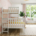 White wooden bunk bed in bright kids' bedroom with pink geometric wallpaper, pastel bedding, yellow throw, large window and indoor plant