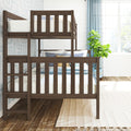 Dark wood twin-over-full bunk bed in bright modern kids bedroom with blue curtains, patterned wallpaper and potted plant