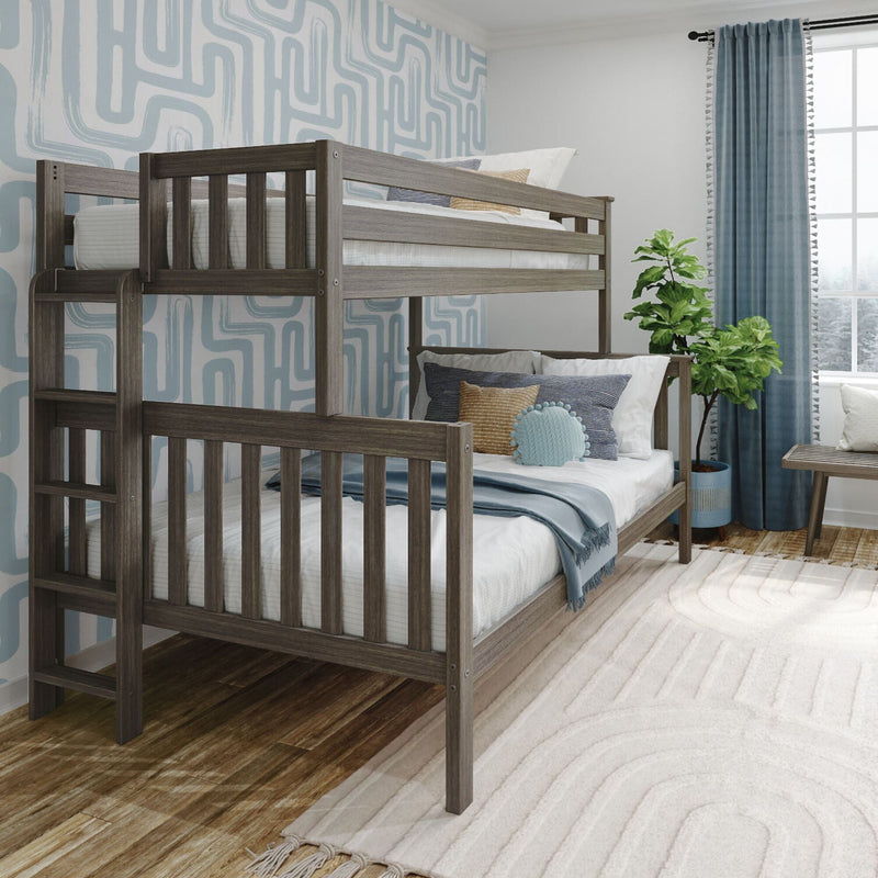 Stylish bedroom with modern wooden bunk beds, geometric wallpaper, and cozy decor elements.