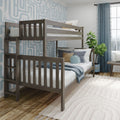 Modern gray wood twin-over-twin bunk bed in a bright children's bedroom with blue geometric wallpaper, layered throw pillows, teal curtains and a potted fiddle-leaf plant