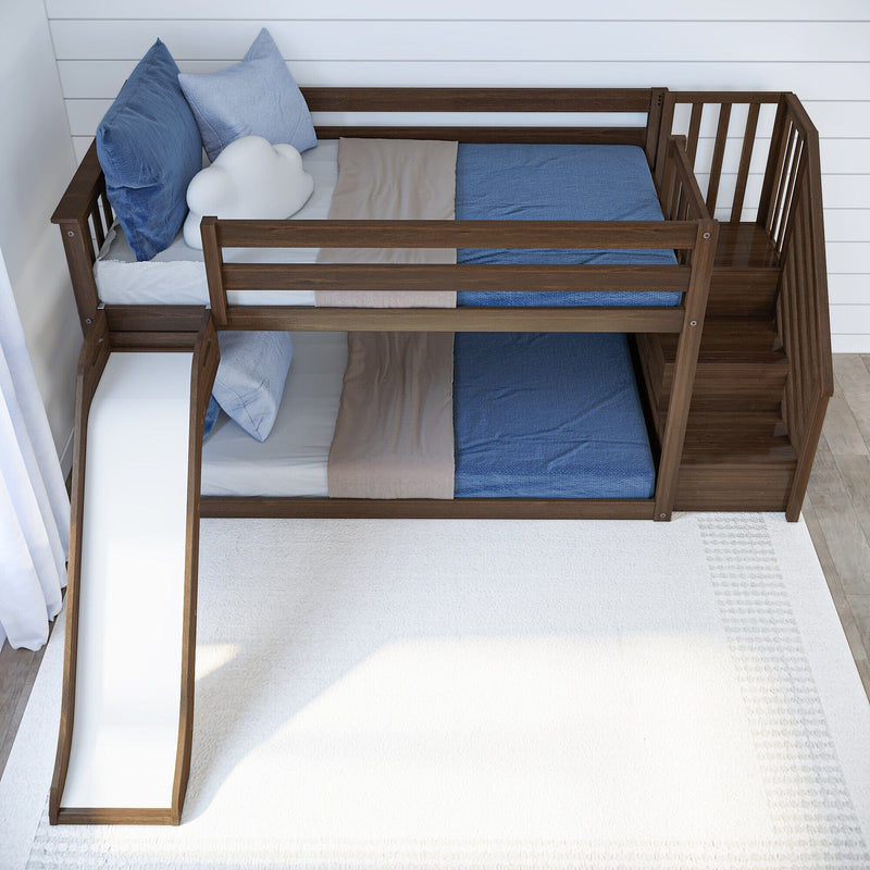 Wooden bunk bed with slide and stairs, featuring blue and beige bedding in a modern children's bedroom.
