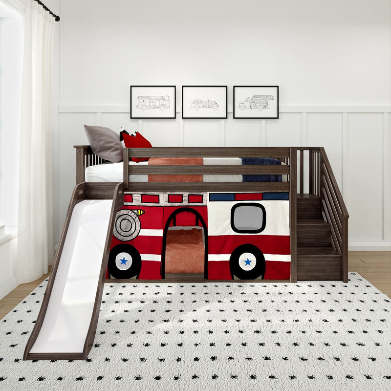 Kids loft bed with slide and stairs featuring a red fire truck playhouse panel, dark wood frame, cozy bedding, white dotted rug and framed truck prints