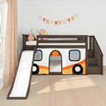 Kids loft bed with slide and staircase — dark wood bunk bed with camper-style play tent panel in a bright white shiplap nursery decorated with pastel bunting and flower pillows