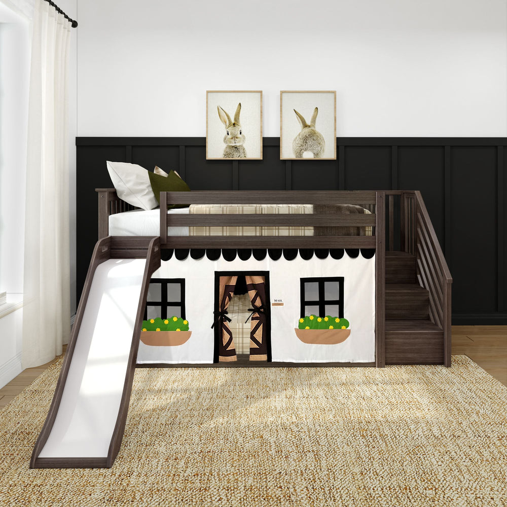 Children’s loft bed with playhouse design, slide, and storage stairs against a black paneled wall in a cozy bedroom.