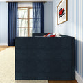 Modern cozy bedroom interior with navy sofa, blue-and-white striped wallpaper, sheer navy curtains, wooden window, decorative pillows and framed red car wall art