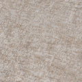 Beige textured carpet close-up with subtle geometric pattern and plush pile, modern area rug for living room or bedroom