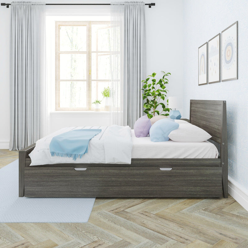 Modern bedroom interior with a wooden storage bed, cozy bedding, and natural light through a large window.