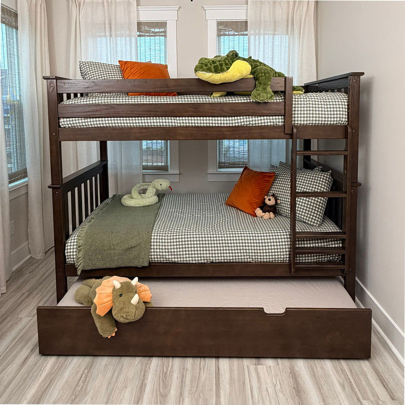 Dark wood bunk bed with pull-out trundle, green gingham bedding, orange accent pillows and plush animals (crocodile, snake, monkey, triceratops) in a bright children's bedroom, kids' bedroom decor