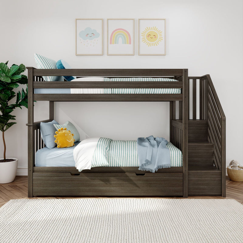 Wooden bunk bed for kids with stairs and under-bed drawers, striped teal bedding, plush sun pillow, and pastel cloud‑rainbow‑sun nursery wall art