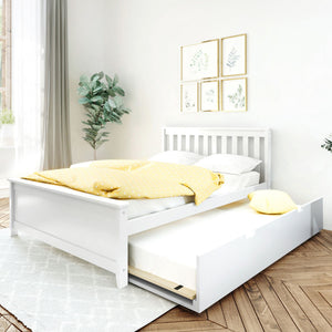 Sunlit minimalist bedroom with white bed and trundle, yellow duvet, botanical wall art and fiddle-leaf plant