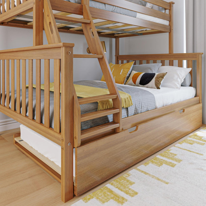 Wooden bunk bed with trundle, featuring cozy yellow and gray bedding in a bright bedroom.