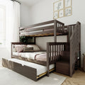 Modern dark wood bunk bed with pull-out trundle and staircase storage in bright neutral children's bedroom with pink bedding and framed wall art