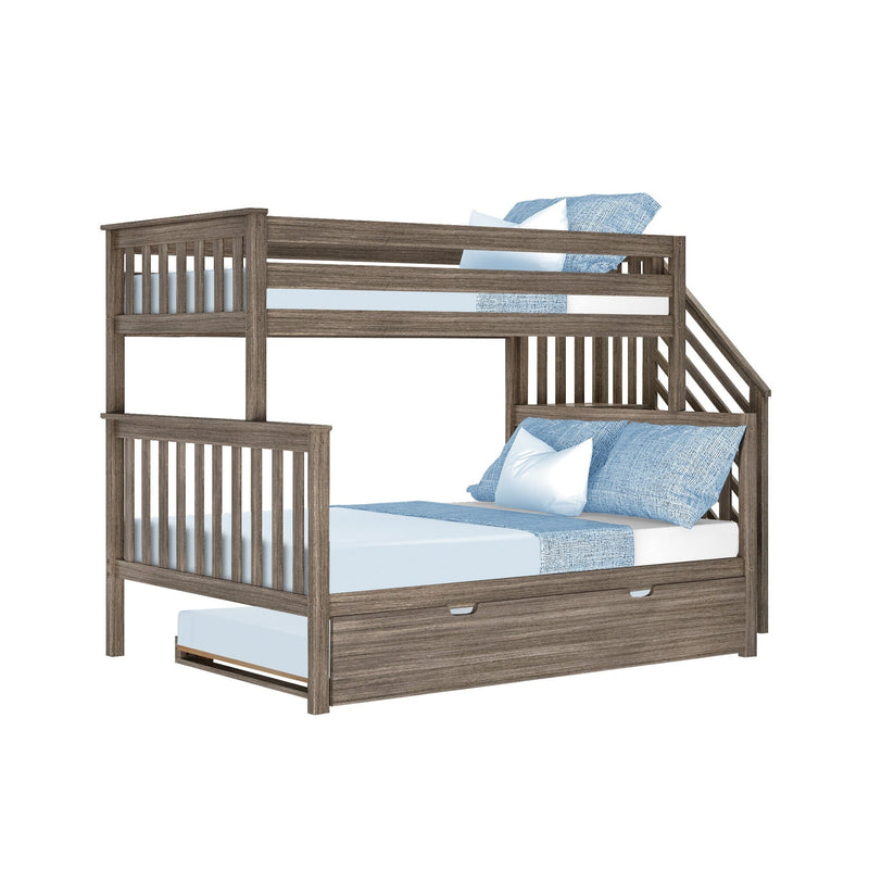 Rustic gray wood twin-over-full bunk bed with pull-out trundle, built-in staircase and safety rails, styled with light blue sheets and pillows for a kids' bedroom