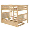 Light natural wood bunk bed with built-in ladder, slatted safety rails and pull-out underbed trundle drawer — solid-wood modern design