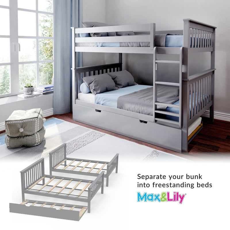 Gray wooden convertible bunk bed with ladder, trundle drawer and blue bedding in a bright kids' bedroom, converts into two twin beds