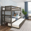 Gray wooden bunk bed with pull-out trundle in a modern kids' bedroom with blue geometric wallpaper, navy curtains, decorative pillows and potted plant