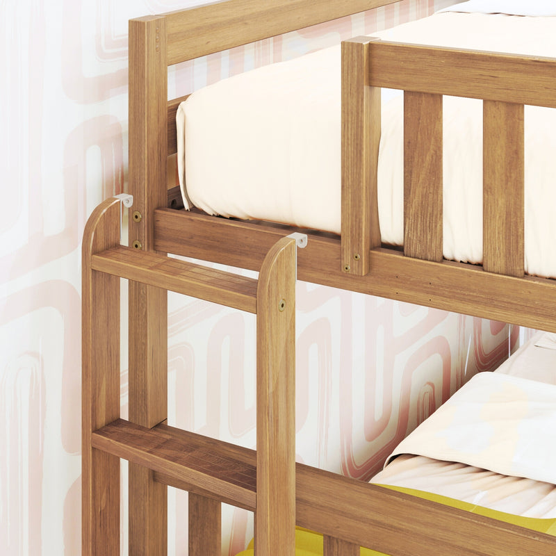 Wooden bunk bed with beige bedding and geometric wallpaper background.