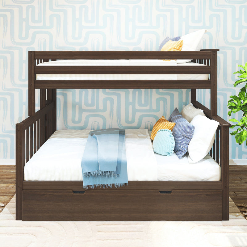 Dark wood twin-over-full bunk bed with under-storage drawer, white bedding, blue throw and decorative pillows in kids' bedroom with blue geometric wallpaper