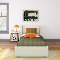 Kids bedroom with green striped bedding, orange plush fox, modern crocodile wall art, orange bedside lamp and soccer ball