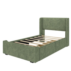 Green upholstered bed frame with wooden slats and a tall headboard.