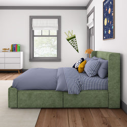 Cozy children's bedroom with green upholstered bed, blue gingham bedding, and space-themed decor.