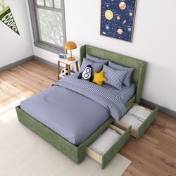 Child's bedroom with green upholstered bed, blue bedding, decorative pillows, and under-bed storage drawers.
