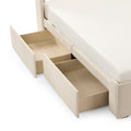 Cream upholstered platform storage bed with white quilted mattress and two large wooden under-bed pull-out drawers