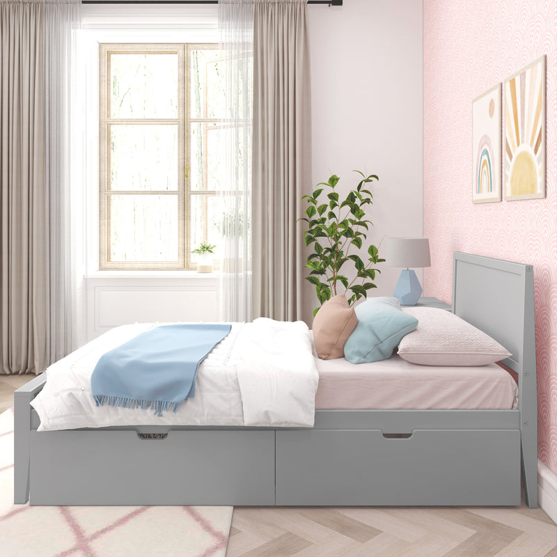 Modern bedroom with gray storage bed, cozy pillows, and pink accent wall featuring abstract art, ideal for stylish home decor inspiration.