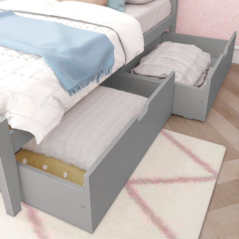 Modern bedroom with grey under-bed storage drawers and cozy bedding ensemble.