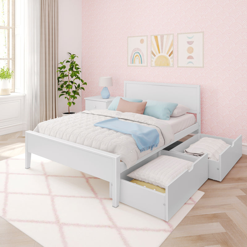 White modern platform bed with storage drawers in a bright bedroom with pastel decor and houseplants.