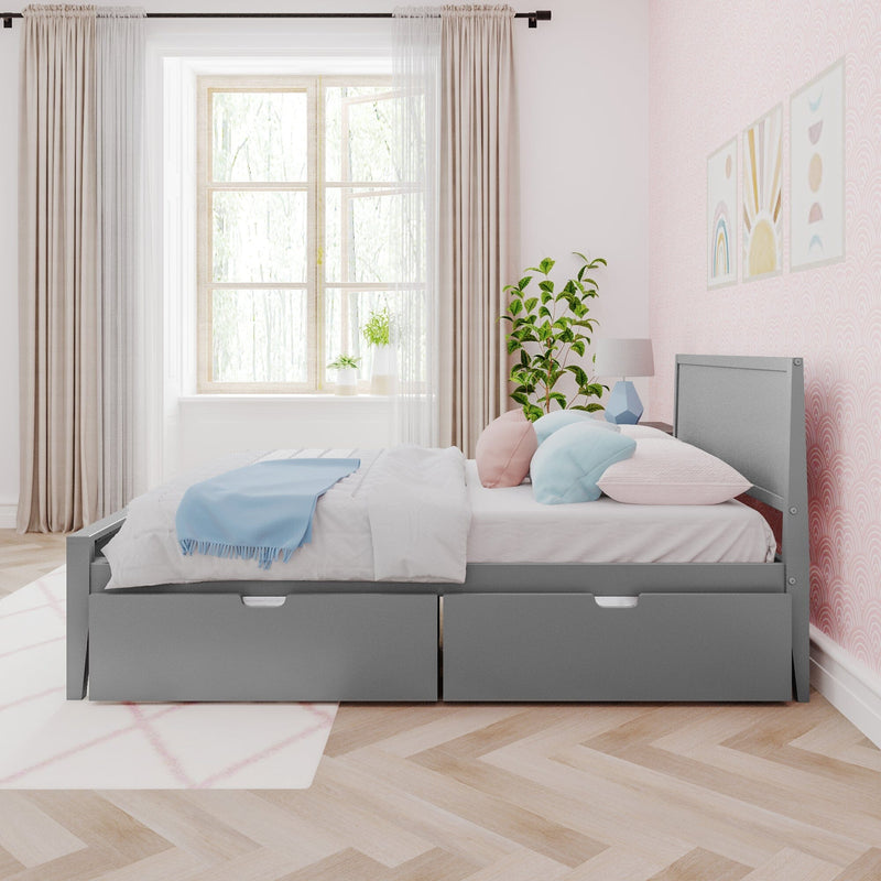 Gray bed with storage drawers in a bright bedroom featuring pink walls, large window, and decorative plants.