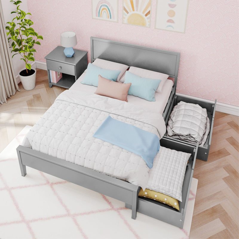 Gray storage bed with pastel pillows and drawers in a modern bedroom setting.