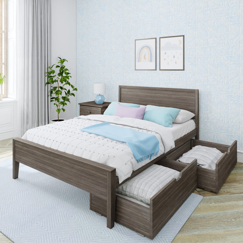Modern gray wood platform bed with built-in under-bed storage drawers, pastel blue and lavender bedding, nightstand with lamp, potted plant and light blue patterned wallpaper in a bright bedroom