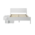 White wooden platform bed frame with solid headboard, slatted mattress support and pull-out under-bed storage drawers, modern bedroom furniture