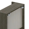Close-up of gray wood cabinet top with metal mounting brackets and white nylon rollers for sliding door hardware