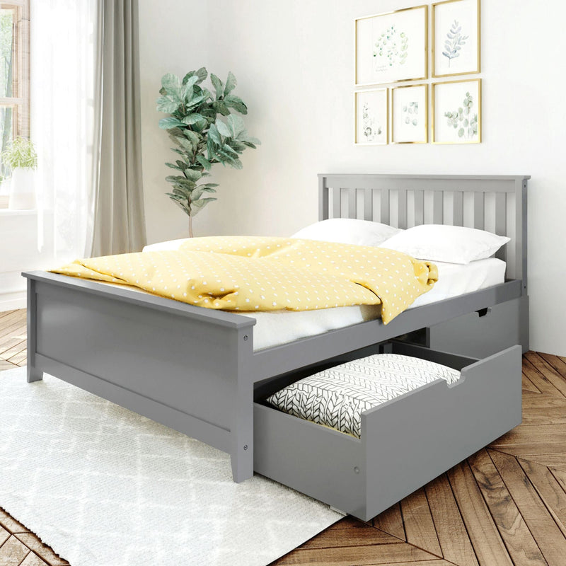 Gray wooden bed frame with storage drawers, yellow polka dot duvet, and white pillows in a bright bedroom with decorative plant and wall art.