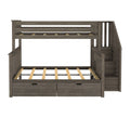 Gray wood twin-over-full bunk bed with staircase and two under-bed storage drawers, space-saving kids bedroom furniture