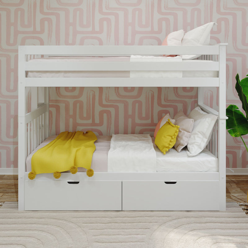 White wooden bunk bed with yellow pillows and blanket in a modern kids' room with pink geometric wallpaper.