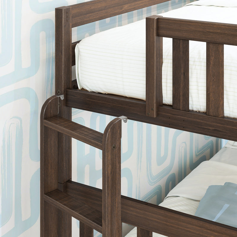 Close-up of dark walnut twin-over-twin wooden bunk bed ladder and guardrail with white fitted sheet and blue retro wallpaper, sturdy solid-wood construction
