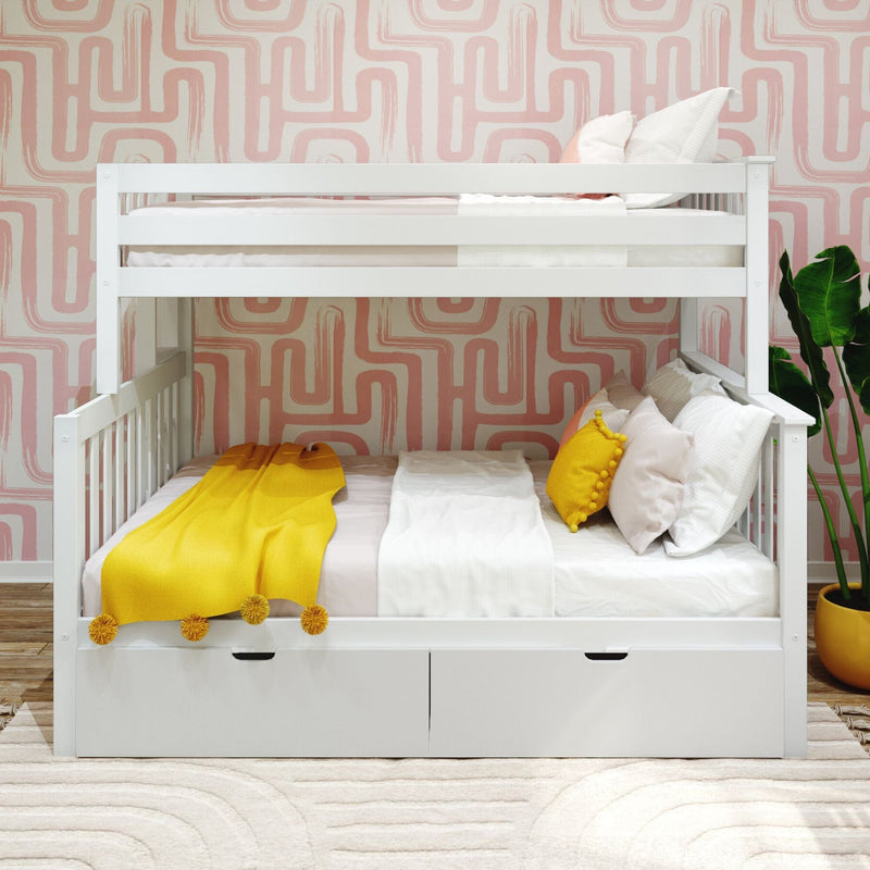 White wooden bunk bed with under-bed storage drawers, yellow throw blanket and accent pillows against pink geometric wallpaper in a modern kids' bedroom with potted plant and textured area rug