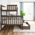Dark walnut wooden bunk bed for kids with under-bed storage drawers in a bright modern bedroom featuring blue curtains, large window and potted plant