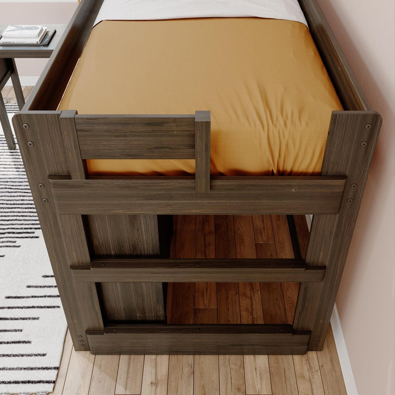 Wooden loft bed with warm-toned bedding and hardwood floor in minimalist bedroom setting.